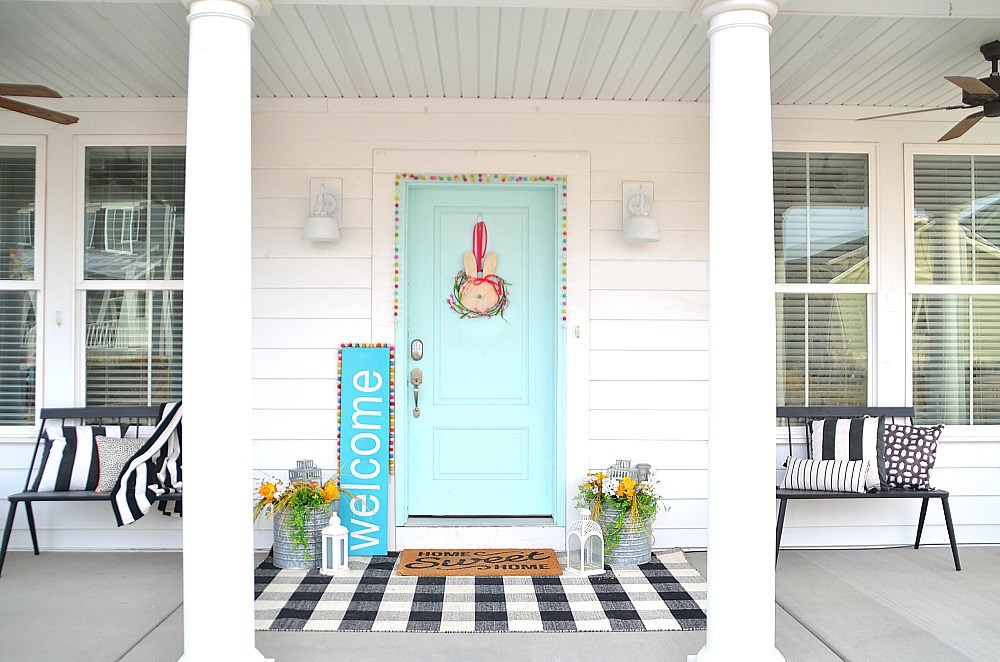 Spring porch iwth bunny sign and giant welcome sign. 