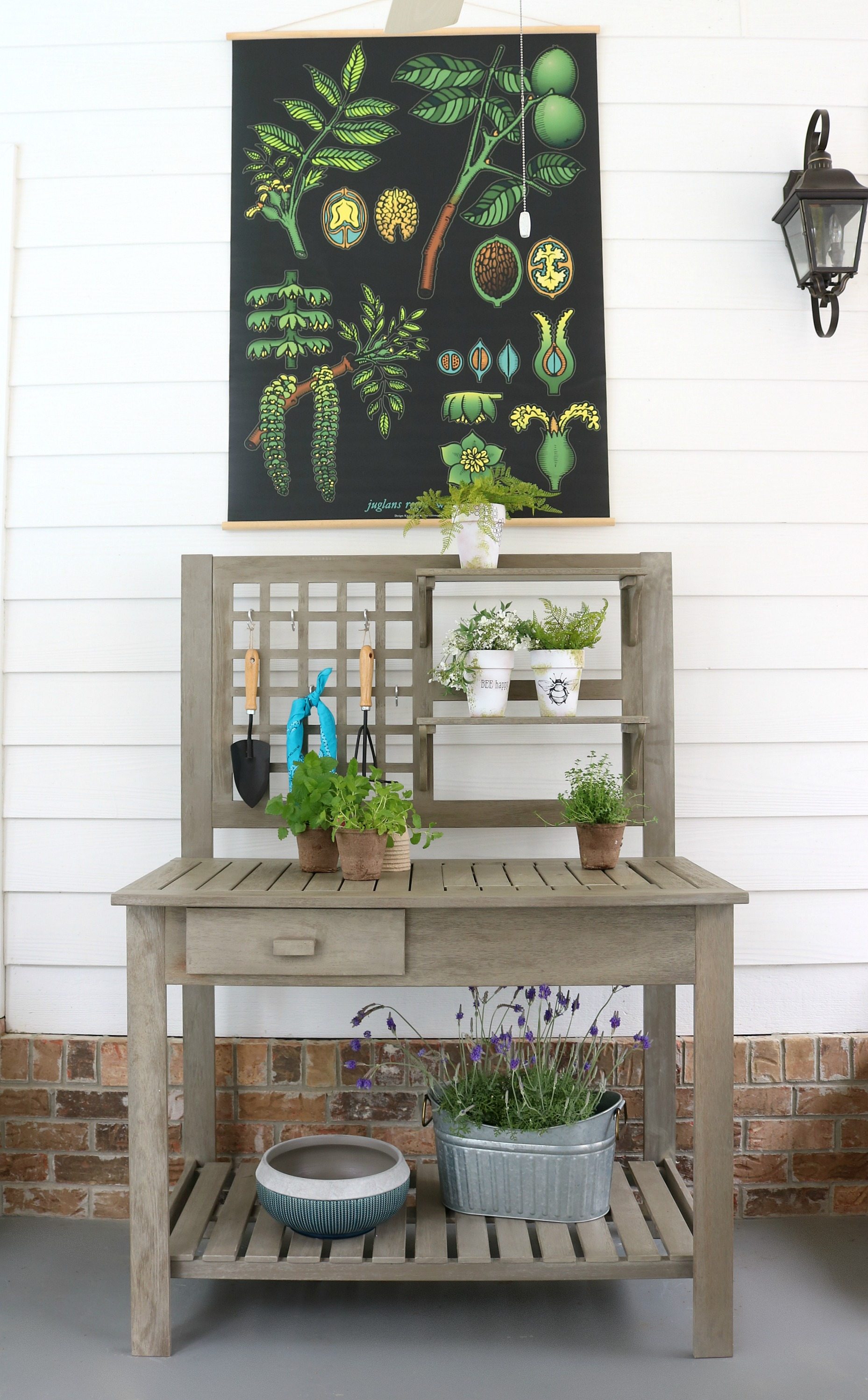 18 DIY Spring Home Ideas!  Potting Bench DIY. sSimple wood farmhouse bench with a place t hang tools and shelves for plants. 