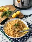 How to make Instant Pot Lemon Parmesan Pasta. It's So easy! In 8 minutes you can have perfect lemon parmesan pasta for your family. Make it in your pressure cooker for a quick dinner idea!