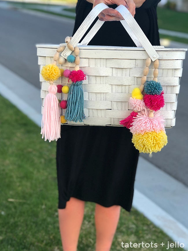 Thrifted BOHO Pom Pom Picnic Basket Makeover! Give a thrifted picnic basket new life and a boho spring makeover with spraypaint and yarn. I will show you how to make BOHO beaded embellishments that will make your new picnic basket shine! 