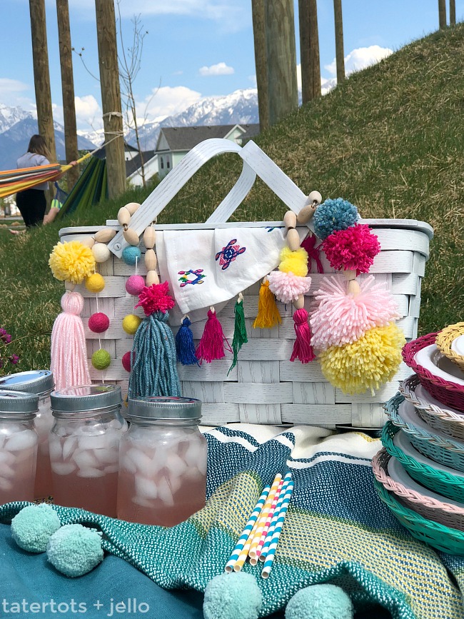 Thrifted BOHO Pom Pom Picnic Basket Makeover! Give a thrifted picnic basket new life and a boho spring makeover with spraypaint and yarn. I will show you how to make BOHO beaded embellishments that will make your new picnic basket shine! 