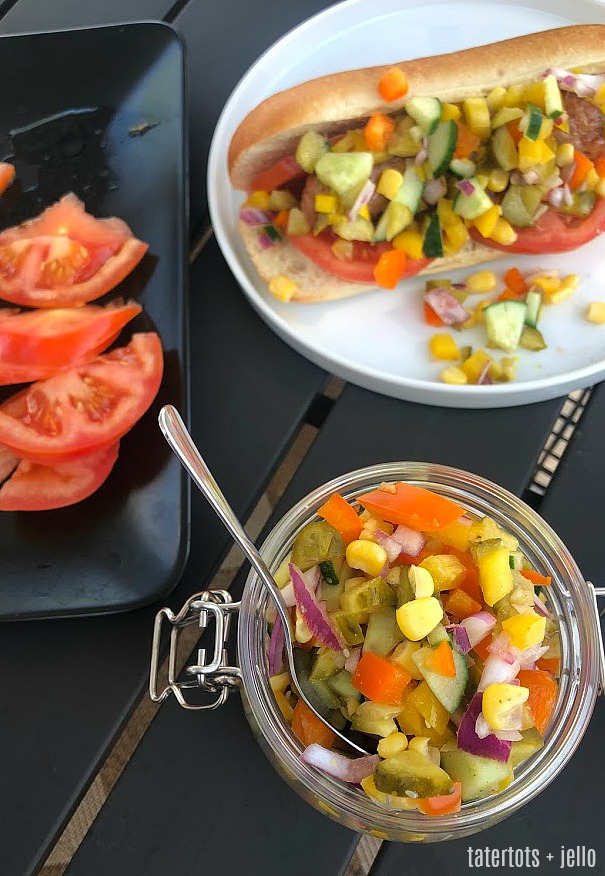Fresh Pickle Veggie Relish is the perfect topping for your Summer BBQ. Pickles, fresh veggies and a light dressing are all combined to make the perfect topping for your hamburgers, hot dogs and sandwiches this summer! 