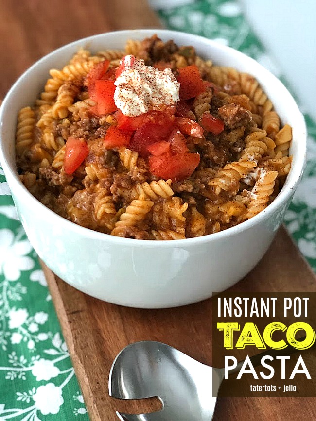 Instant Pot Taco Pasta is a quick, filling and tasty dinner that kids love! Ground beef or sausage, combined with hearty noodles, salsa, Mexican seasonings and cheese in a creamy sauce, topped with tomatoes and sour cream. In just a few minutes dinner is ready! 