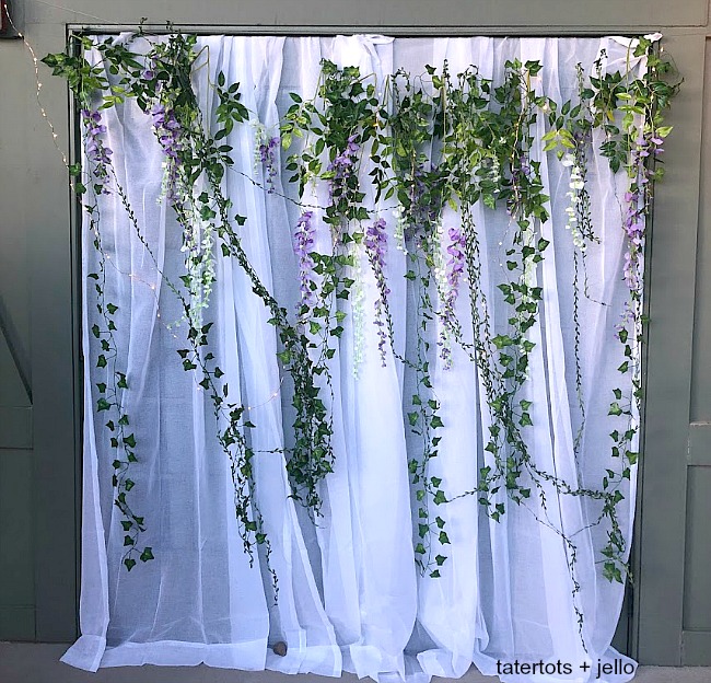 Create a simple Romantic Summer Photo Backdrop for a prom, wedding or party. You can put this photobooth together without nails or hooks. 