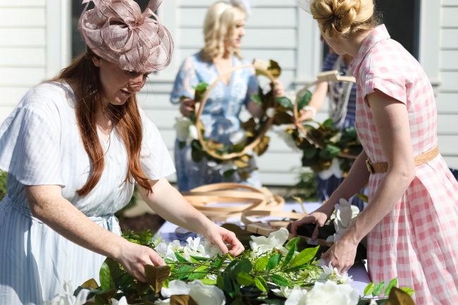 Make a DIY Magnolia Garden Wreath for Summer. All it takes is a few materials and in less than 15 minutes you will have a beautiful wreath to hang on your door or wall! 