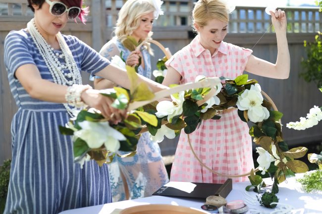 Make a DIY Magnolia Garden Wreath for Summer. All it takes is a few materials and in less than 15 minutes you will have a beautiful wreath to hang on your door or wall! 