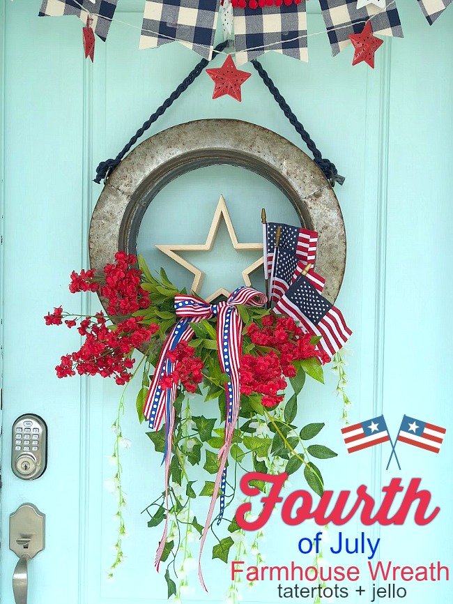 Create a memorable Fourth of July wreath. The galvanized wreath base holds a wooden star surrounded by three flags, a painted 4 and beautiful red and blue flowers and draping greenery. 