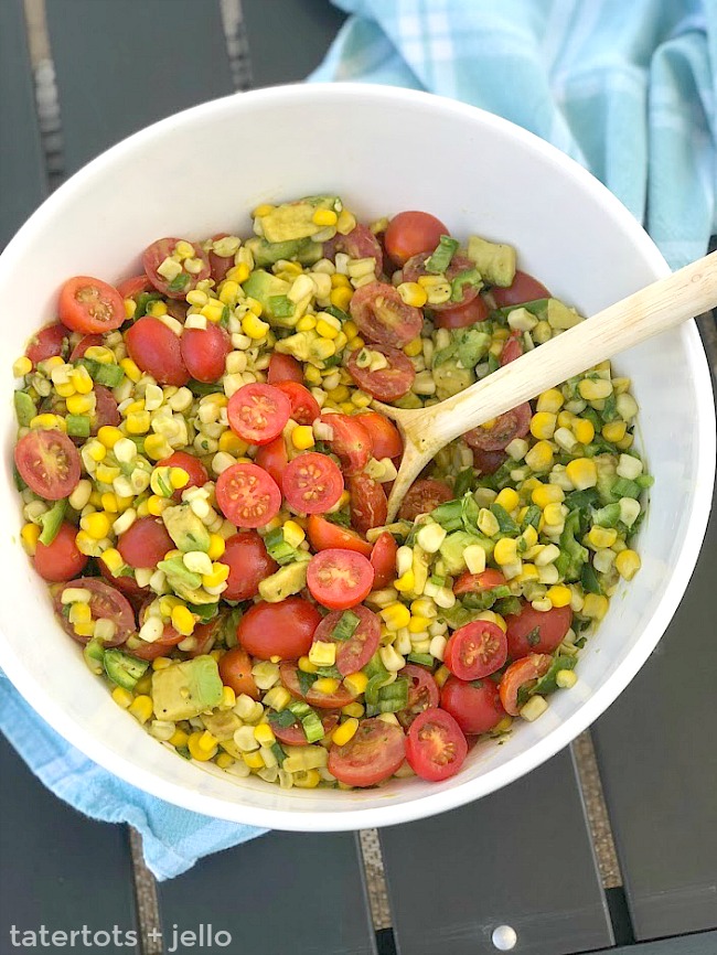 Celebrate the bounties of summer with the perfect trifecta of corn, avocados and tomatoes! Creamy avocado, baby tomatoes and crunchy corn are covered in an zesty citrus lemon olive oil dressing. It's the perfect summertime salad - perfect for dinner or to take to a BBQ or potluck! 
