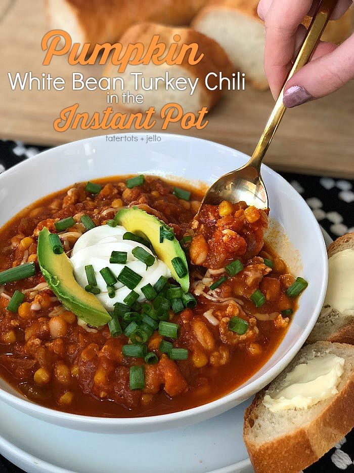 Pumpkin White Bean Turkey Chili is the perfect Fall meal. Based on an award winning pumpkin chili that I've made for years, this version takes a fraction of the time because it's made in the Instant Pot! Made with pumpkin puree, ground turkey, white beans, corn, green chilis and zesty spices, we top it with sour cream, green onions and avocado. It is also amazing serves with a baguette or crispy tortilla chips. 