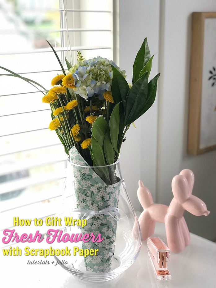 How to Gift Wrap Fresh Flowers with Scrapbook Paper! Give the gift of fresh flowers and wrap them in beautiful paper and ribbon for a gift everyone will love! 