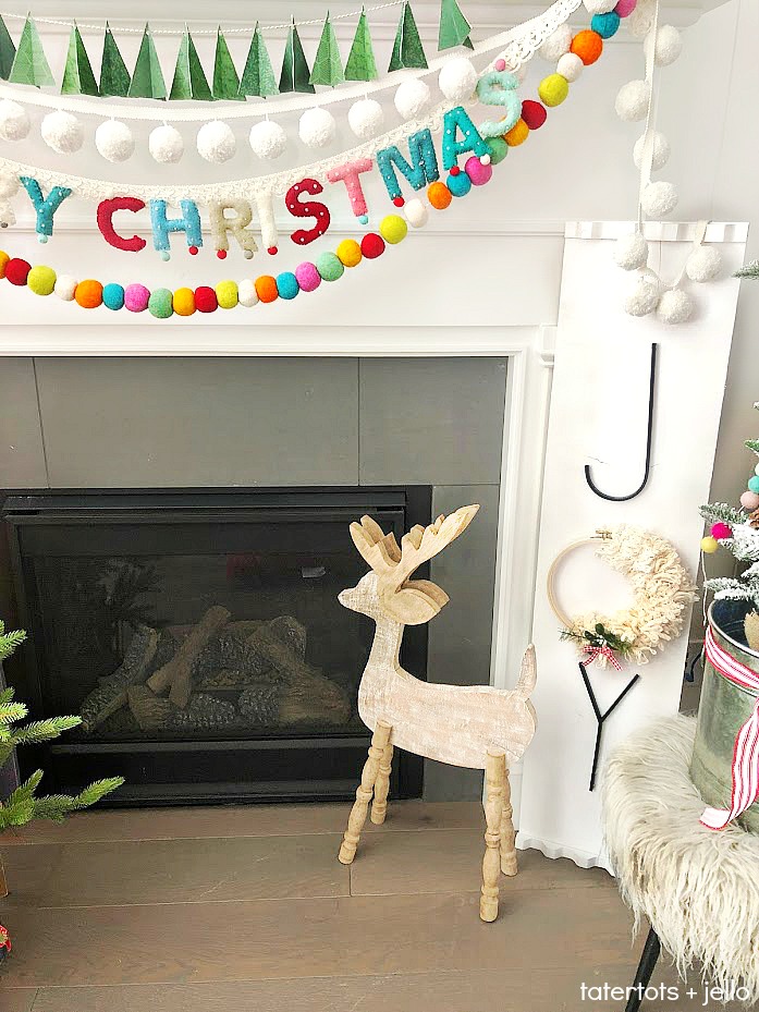 Joy to the world mantel - colorful mantel. Create handmade elements and color for a bright and whimsical mantel this holiday season. Handmade embroidery hoop sayings and giant sign DIY tutorials.