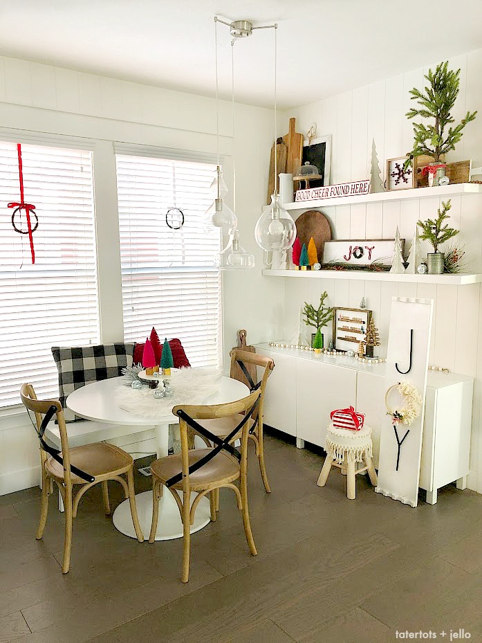 Cozy Christmas Nook Decorating Ideas! Decorate shelves in your kitchen for the holidays with DIY projects, greenery and trees for a welcoming place to gather with your family.