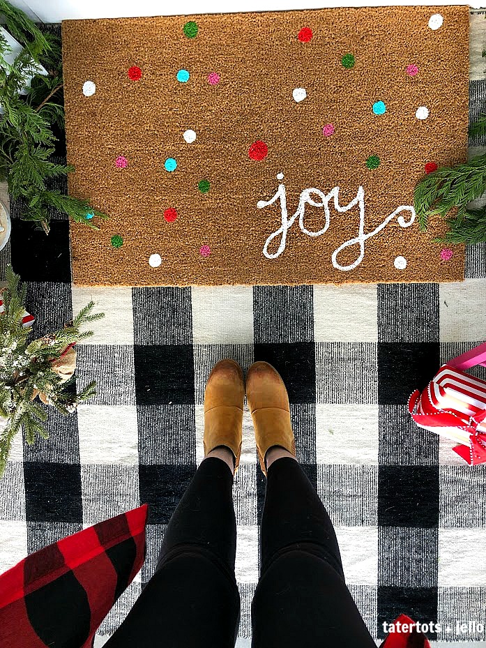 Joy to the World Holiday Porch. Bright colors, a GIANT Joy sign, Snowball Wreath and hand-painted rug create a happy welcome for family and friends with holiday season! 