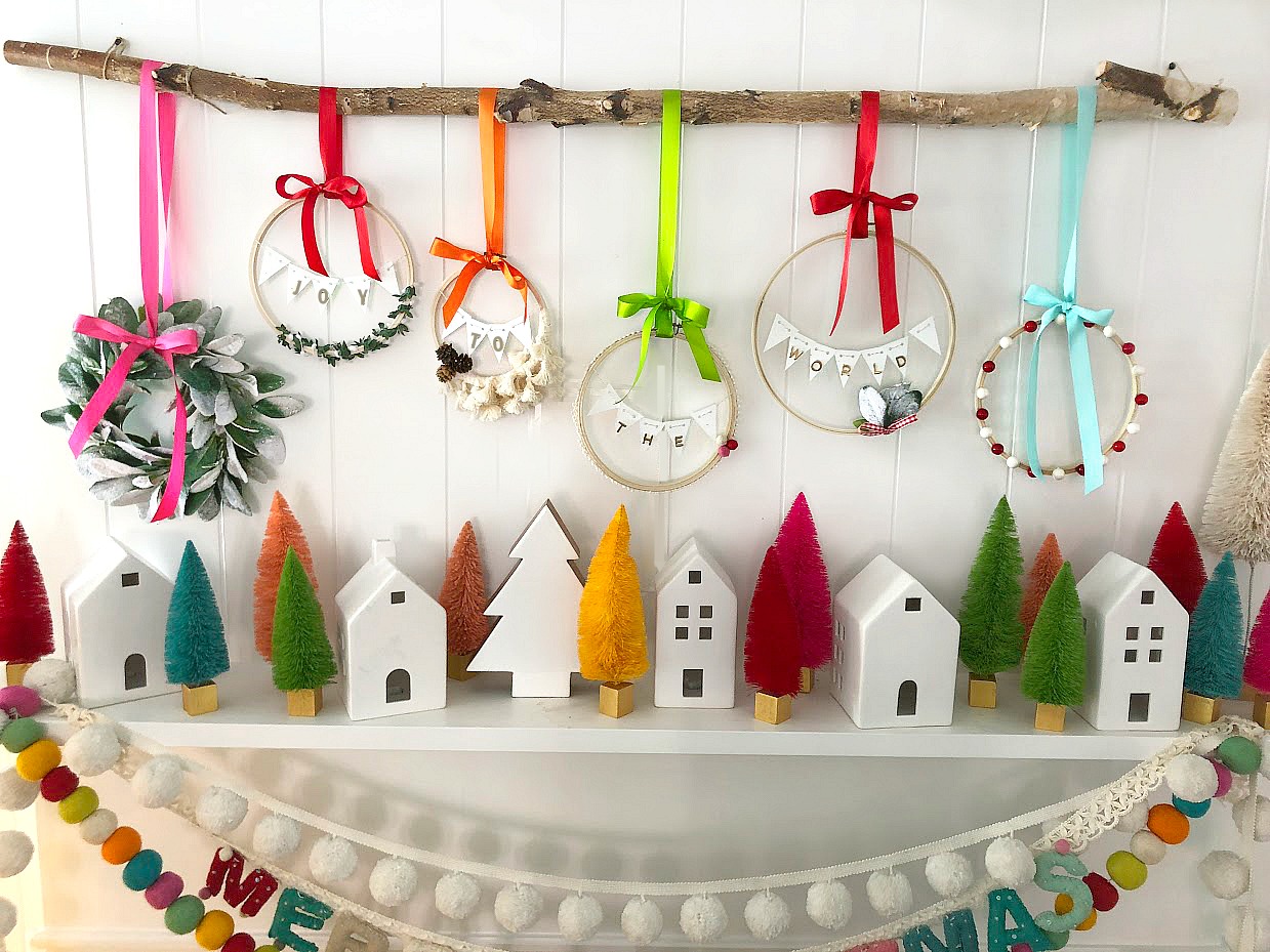 Joy to the world mantel - colorful mantel. Create handmade elements and color for a bright and whimsical mantel this holiday season. Handmade embroidery hoop sayings and giant sign DIY tutorials.