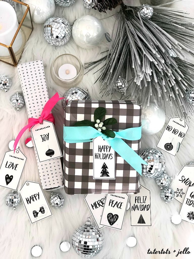 Scandinavian-style black and white holiday printable tags. 12 free black and white holiday gift tags that you can print off and add to your packages this holiday season!