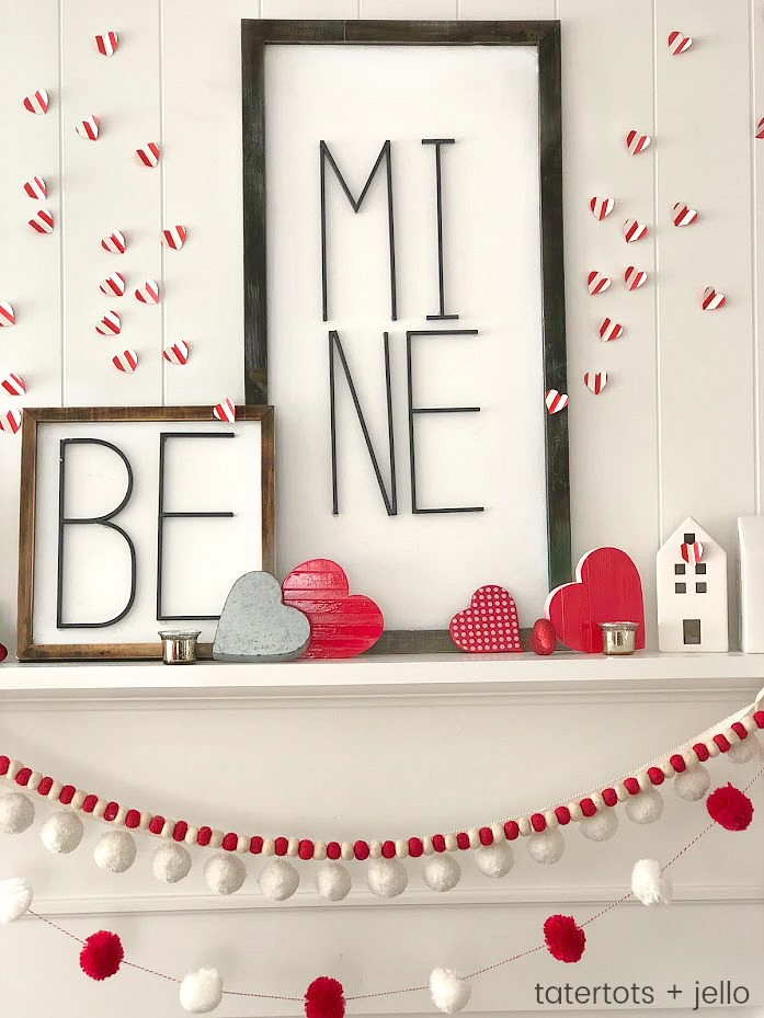 Be Mine Valentine's Day Mantel Ideas! Create a beautiful mantel with these easy and inexpensive DIY ideas -- modern metal letter typography signs, banners and paper hearts!