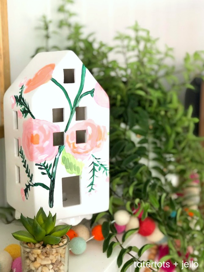 Spring Anthropologie-Inspired Painted Houses. Get your home ready for Spring by painting these cute white houses. You can add them to a shelf or mantel for your home!