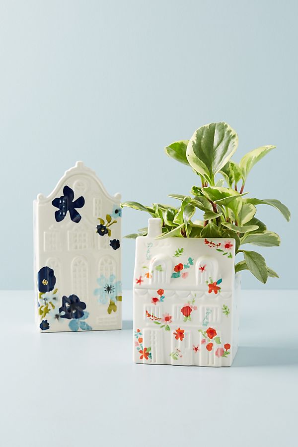 Spring Anthropologie-Inspired Painted Houses. Get your home ready for Spring by painting these cute white houses. You can add them to a shelf or mantel for your home!