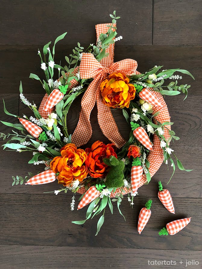 Spring Plaid Carrot Layered Wreath. Layer pretty orange gingham and a pretty floral wreath with a moss bunny and plaid carrots for a wreath that will welcome your guests this Spring!