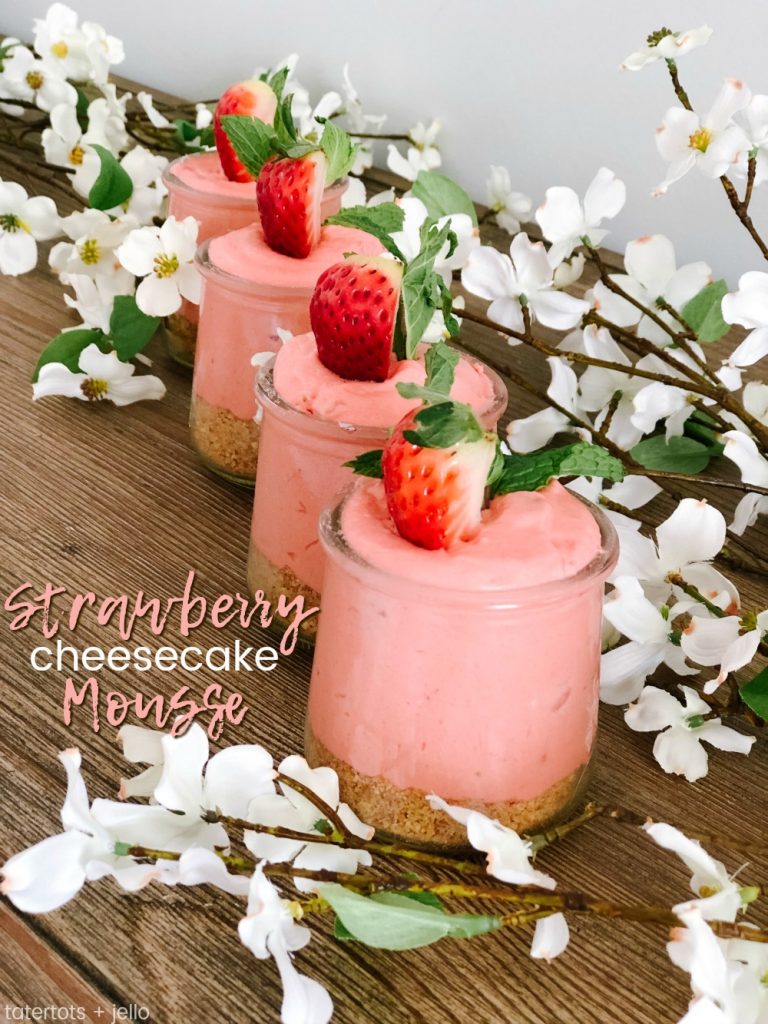 Fluffy Strawberry Cheesecake Mousse! Kick Spring off by making this easy and delicious, light and creamy mousse. It's a great dessert to make ahead of time and wow your dinner guests! 