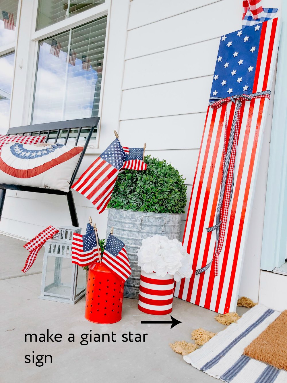 Patriotic Flag Fourth of July Porch. 6 Simple ways to create a bright and colorful porch for the Fourth of July. A handmade giant flag sign, flag wreath, banners and more! 