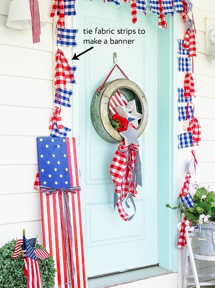 Make a Fourth of July Farmhouse Star Wreath. A galvanized wreath with red white and blue wood stars and gingham fabric is the perfect wreath to celebrate the Memorial Day or the Fourth of July!