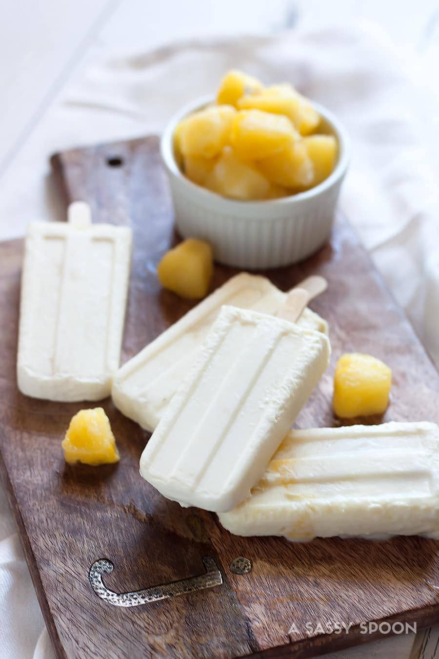 5 Ingredient Pina Colada Popsicles @ A Sassy Spoon
