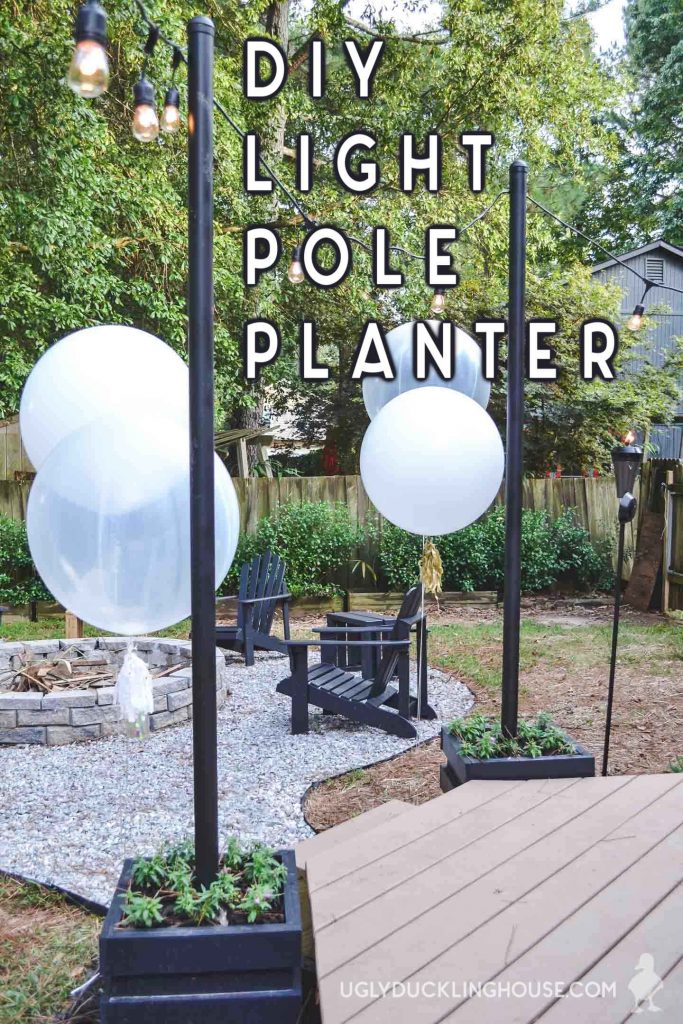 DIY Outdoor Light Pole Planters @ Ugly Duckling House