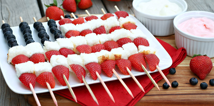 Fruit and Cake Flag Kabobs to make for the Fourth of July! #FourthofJuly #4thofJuly #patrioticparty #partyfood #partyrecipes #partytray