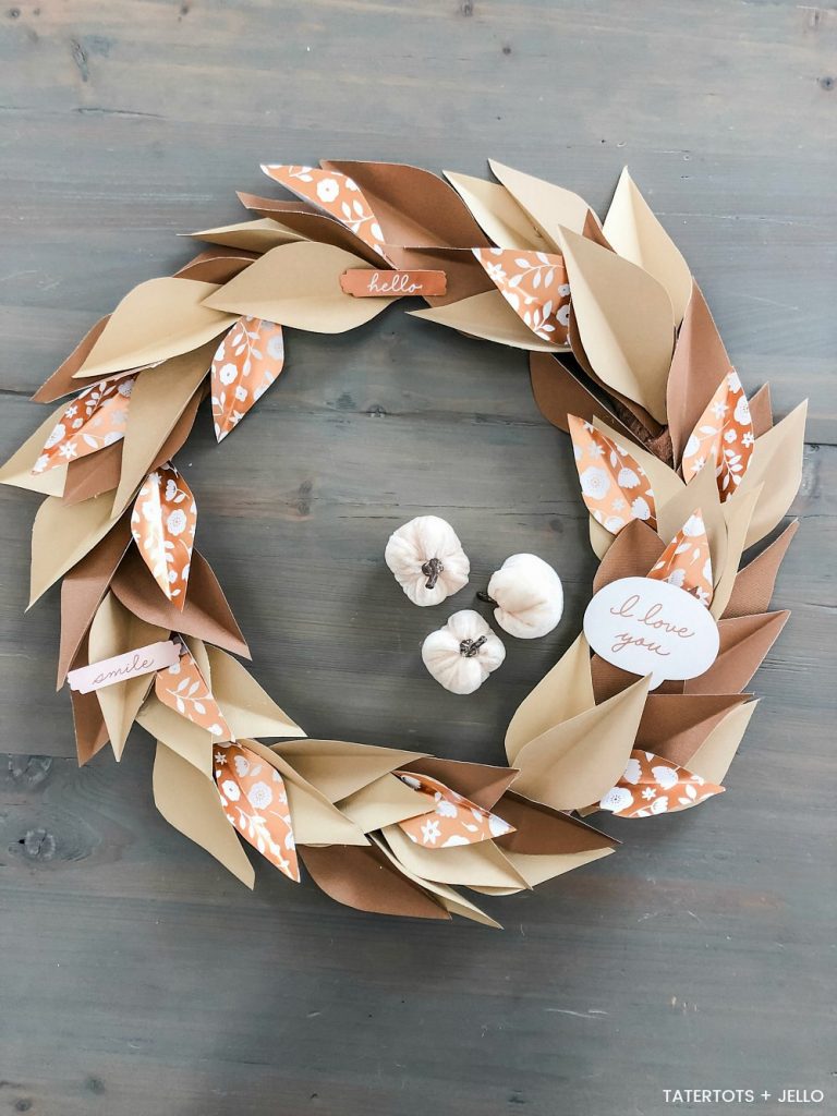 How to Make an Autumn Paper Leaf Wreath! Turn paper into a gorgeous paper leaf wreath that you can use by itself or pair it with a letter board for a beautiful Autumn centerpiece! ﻿