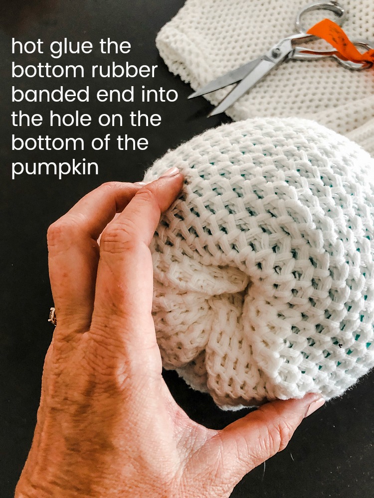 How to make easy fall sweater pumpkins. Use inexpensive dollar store pumpkins and transform them into beautiful decor with thrifted sweaters! 