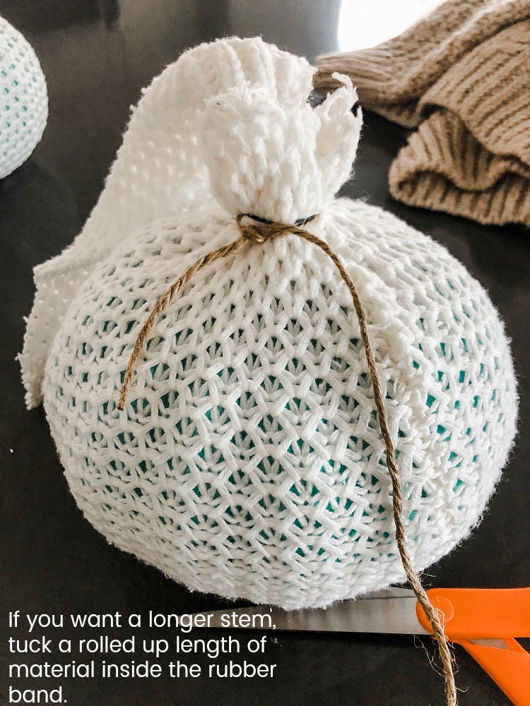 How to make easy fall sweater pumpkins. Use inexpensive dollar store pumpkins and transform them into beautiful decor with thrifted sweaters! 