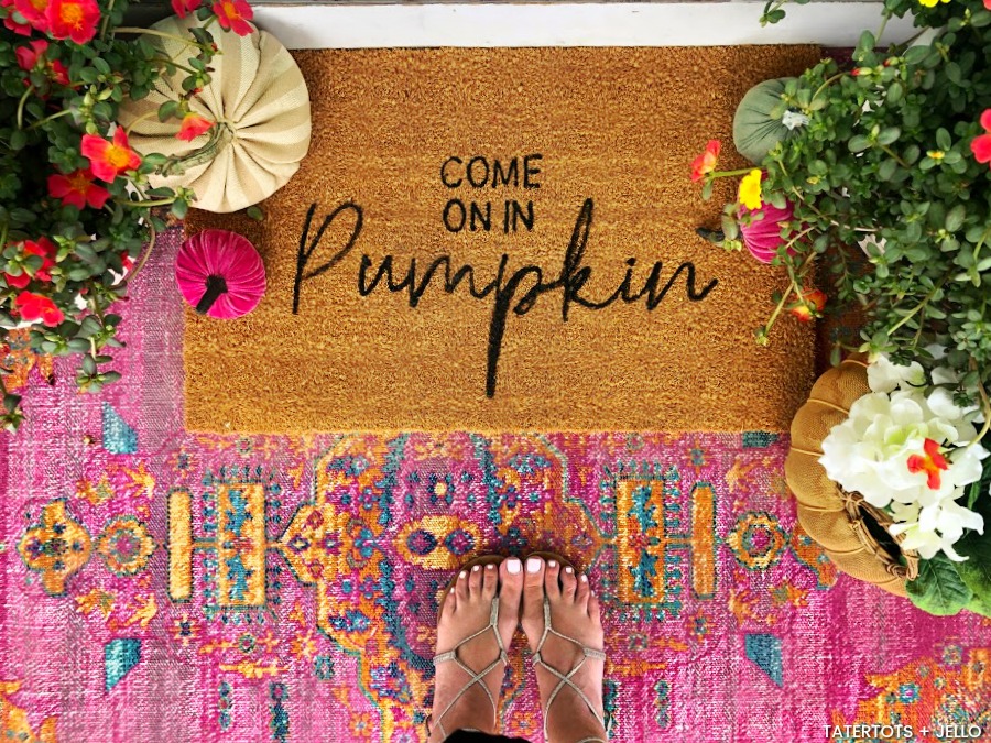 Make an Easy Fall Stenciled Doormat! All you need is a plain doormat and paint to create a welcoming doormat for Fall.