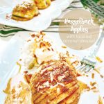 Hasselback Apples with toasted Coconut Streusel Topping. Delicate apple layers are filled with a rich, cinnamon caramel sauce and topped with crunchy coconut streusel topping in this easy recipe! ﻿