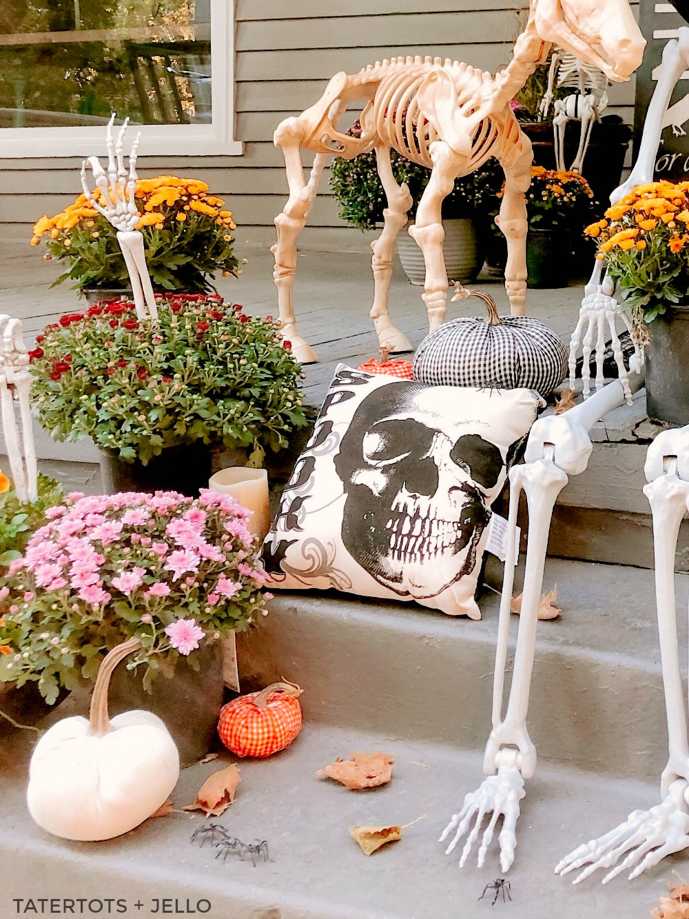 7 Easy Ways to Create a Spooky Skeleton Halloween Porch! Add fresh flowers, lanterns, signs, banners and wreaths to create the perfect spooky Halloween porch! 