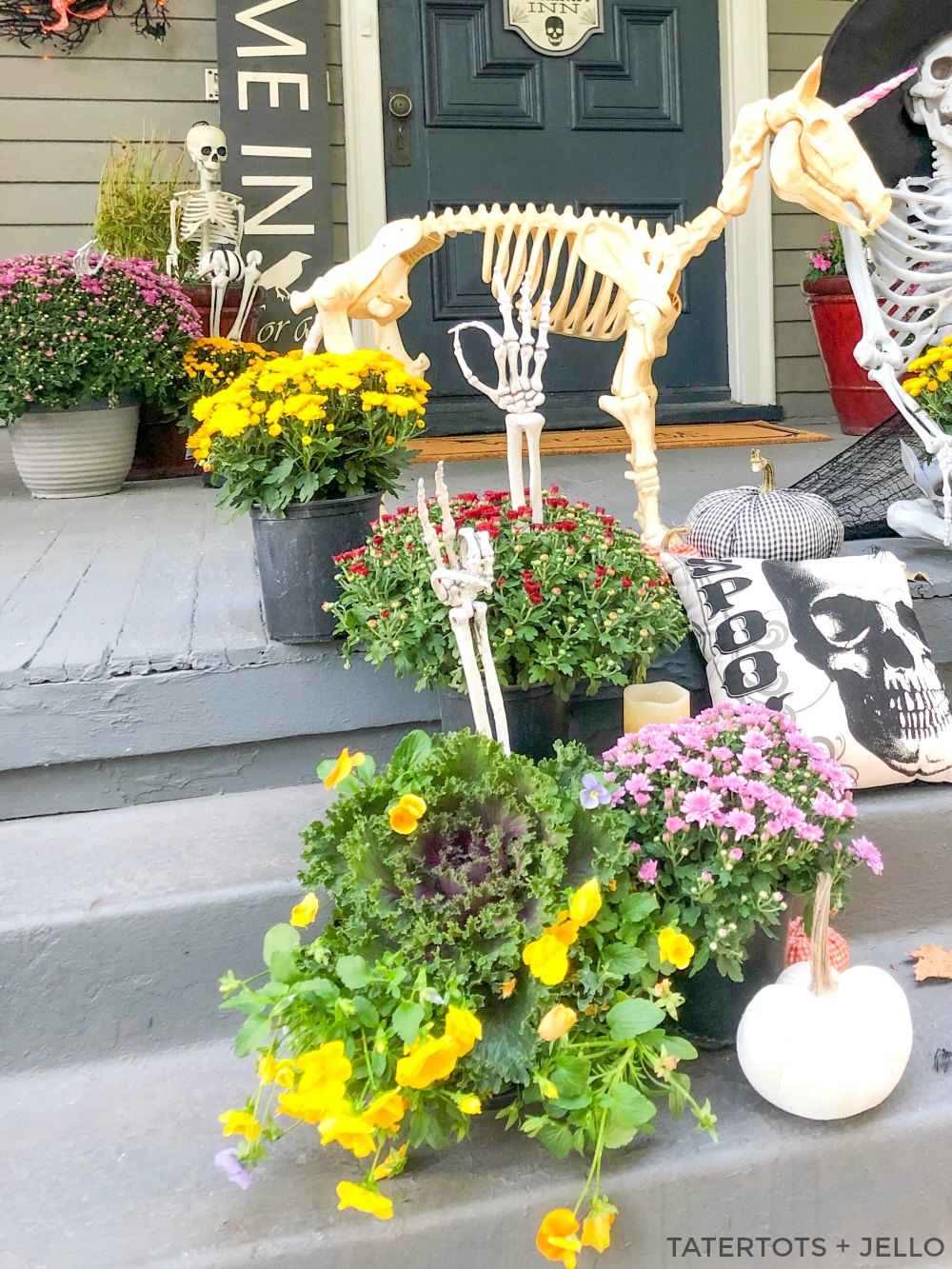 7 Easy Ways to Create a Spooky Skeleton Halloween Porch! Add fresh flowers, lanterns, signs, banners and wreaths to create the perfect spooky Halloween porch! 