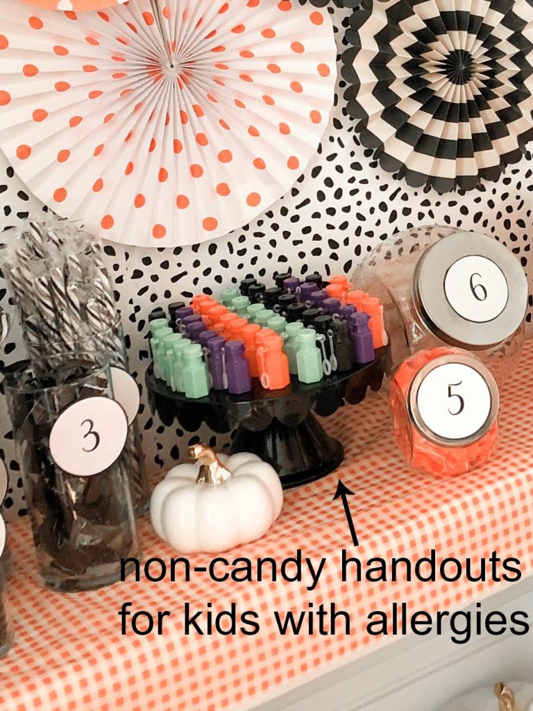 Halloween Trick-or-Treat Candy Station Game with Free Printables. Create a colorful candy station with a game and free printables. perfect for trick-or-treaters or to play at a Halloween party! 