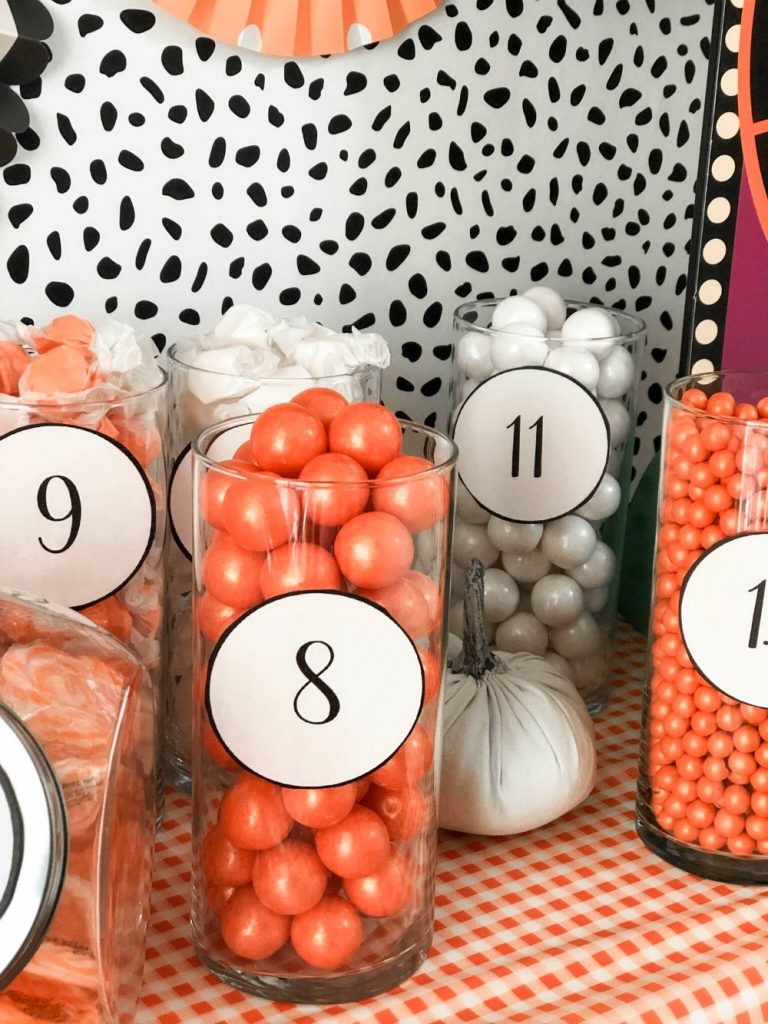 Halloween Trick-or-Treat Candy Station Game with Free Printables. Create a colorful candy station with a game and free printables. perfect for trick-or-treaters or to play at a Halloween party! 