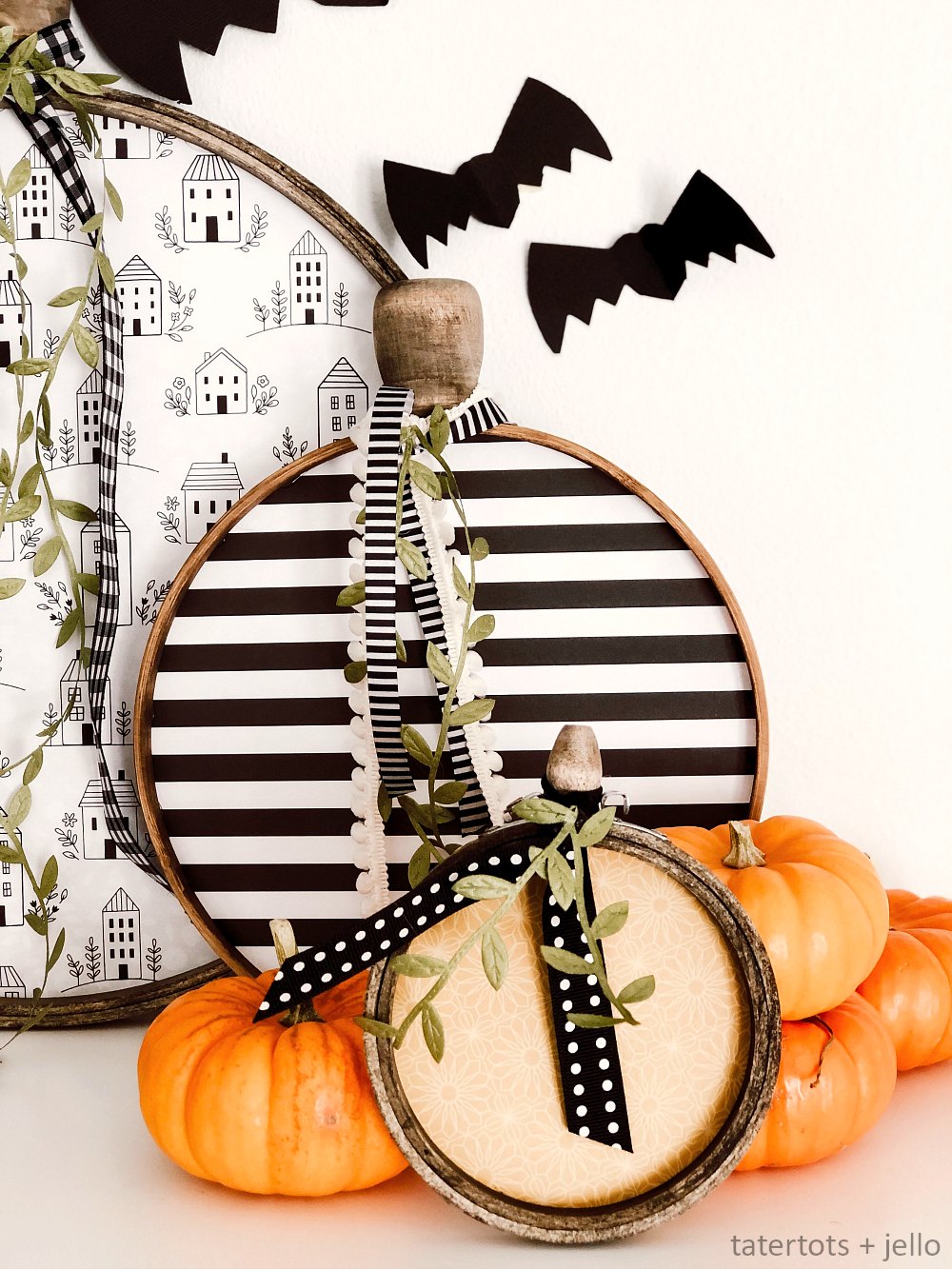 Embroidery Hoop Farmhouse Pumpkins. Turn embroidery hoops pretty and paper into adorable pumpkins you can display all fall long! 