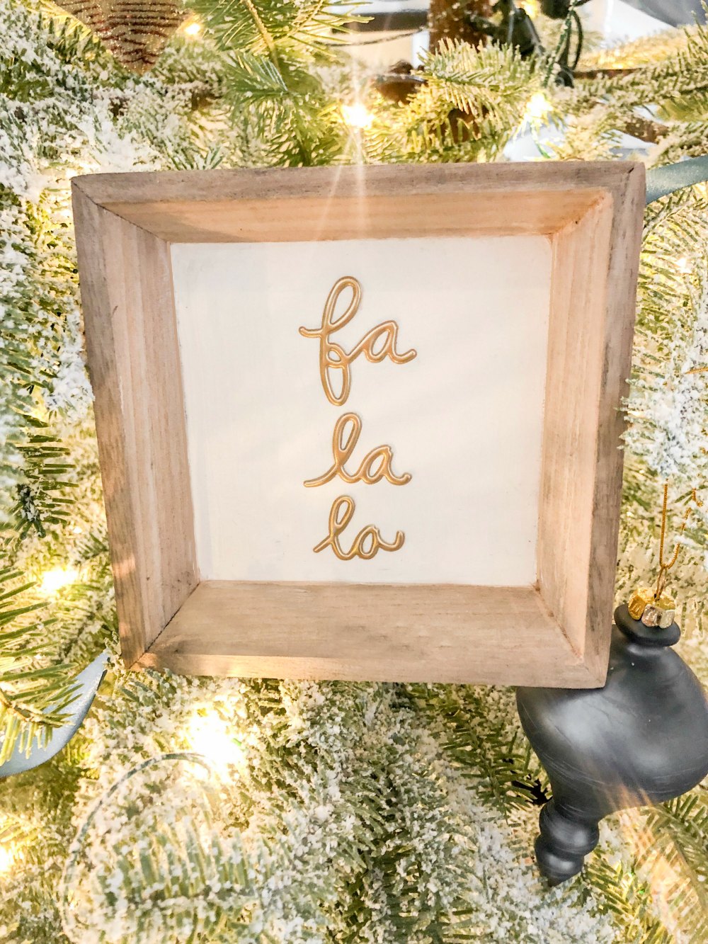 Farmhouse Christmas Sign Ornaments DIY. Create neutral farmhouse-style ornaments with $1 frames and thickers. It's so easy and goes with any decor! ﻿