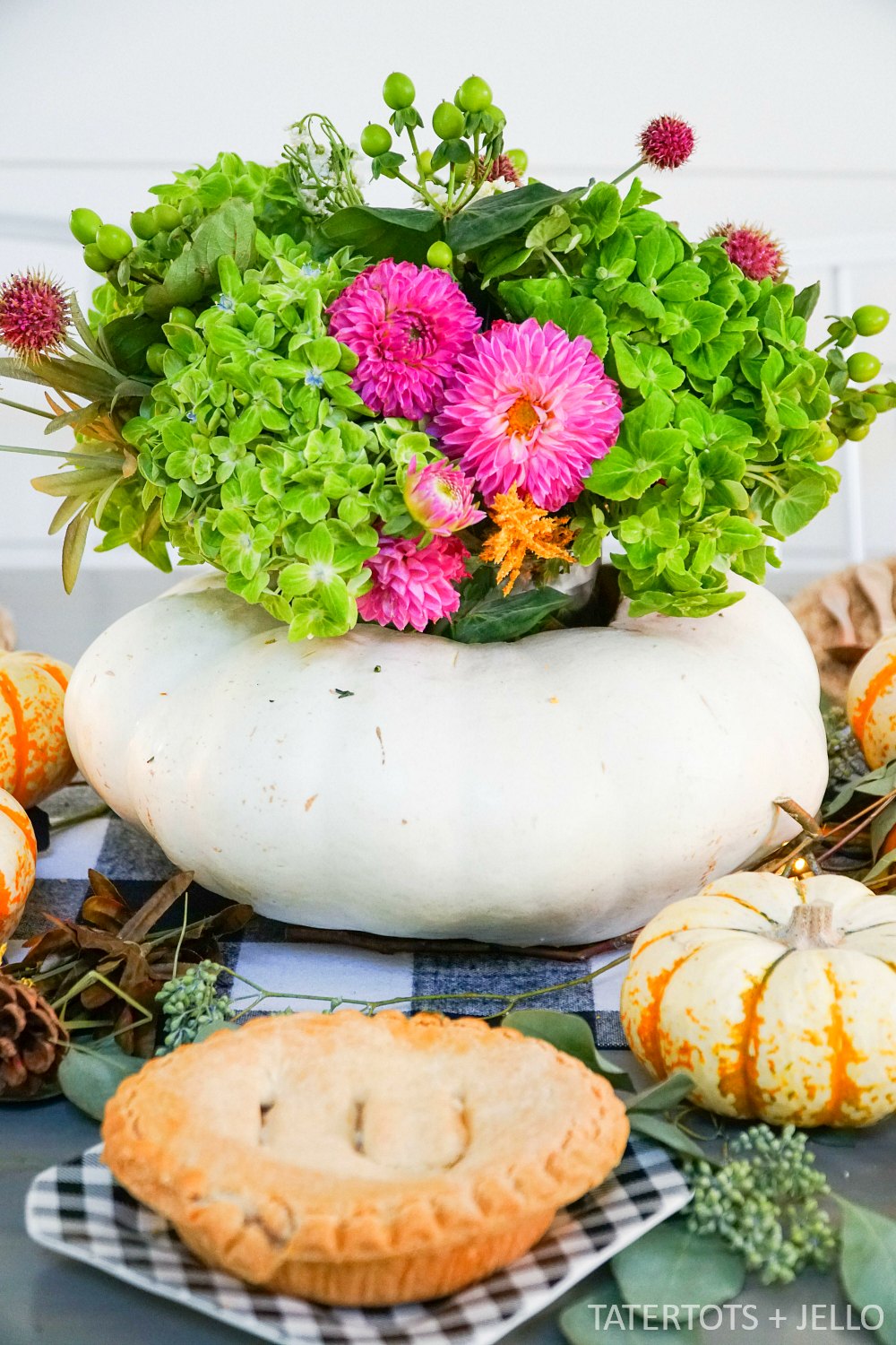 How to make a live pumpkin floral centerpiece. Create a gorgeous natural fall tablescape with a live pumpkin and fresh flowers. 