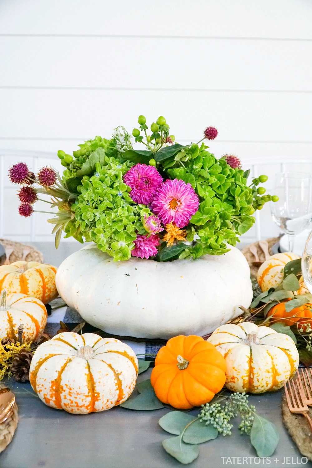 How to make a live pumpkin floral centerpiece. Create a gorgeous natural fall tablescape with a live pumpkin and fresh flowers. 