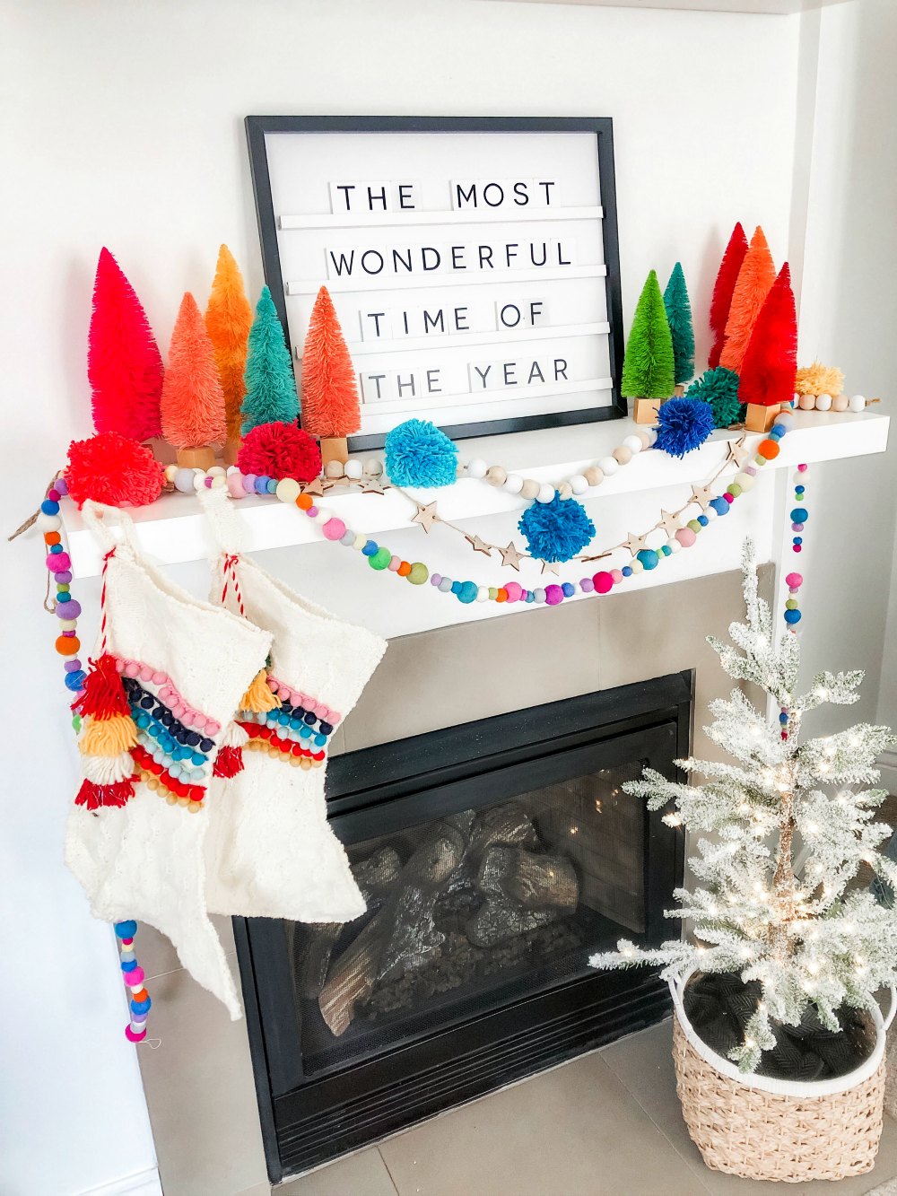 Farmhouse Wood Bead and Pom Pom Garland. Create a beautiful garland for the holidays or all winter long with yarn and beads. 