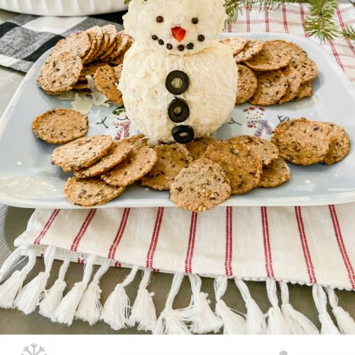 15-Minute Snowman White Cheese Ball Recipe. Mozzarella, cream cheese, Worchesterchire sauce and spices rolled in shaved Parmesan cheese. Divide the cheese ball into two parts and make it into a delightful snowman that will be the hit of any holiday or Winter party!