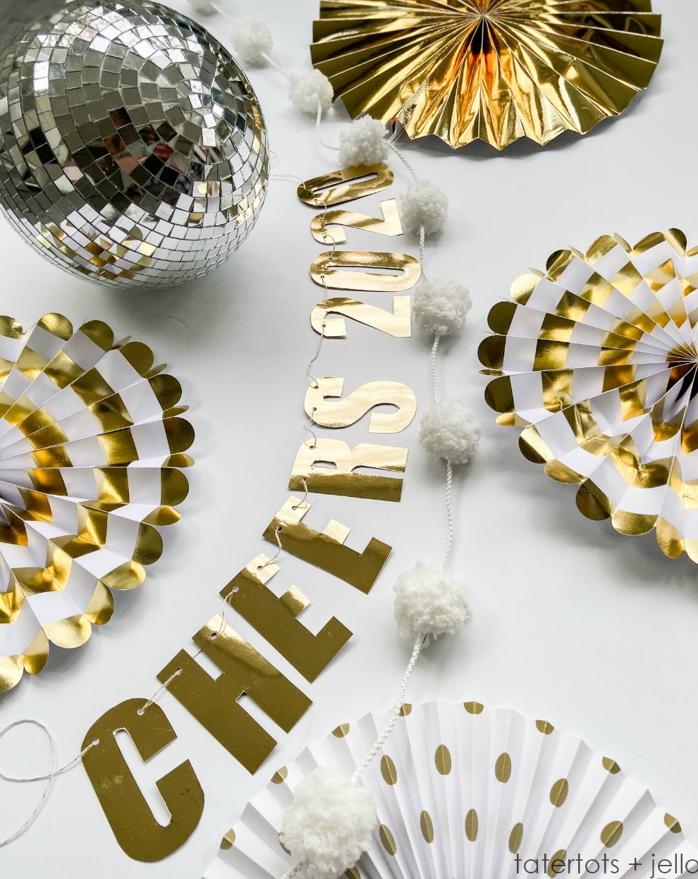 DIY New Years CHEERS Garland and Printable Template. Ring in the New Year with this easy garland. Just print the template on the back of whatever paper you want, cut it out and hang it up for instant NYE decor!