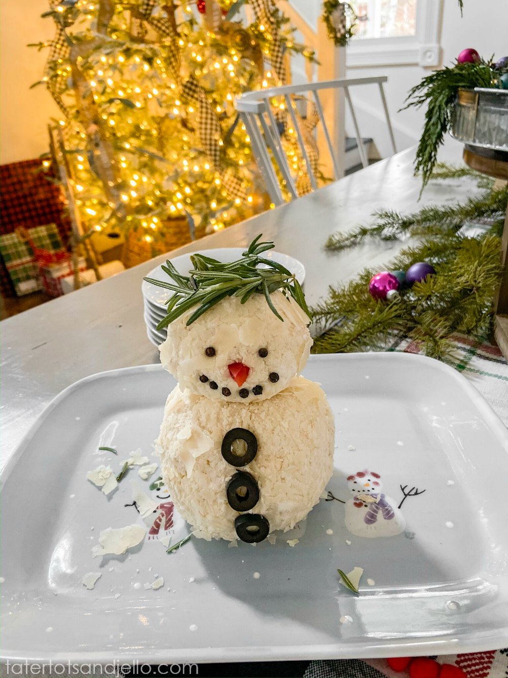 15-Minute Snowman White Cheese Ball Recipe. Mozzarella, cream cheese, Worchesterchire sauce and spices rolled in shaved Parmesan cheese. Divide the cheese ball into two parts and make it into a delightful snowman that will be the hit of any holiday or Winter party! 