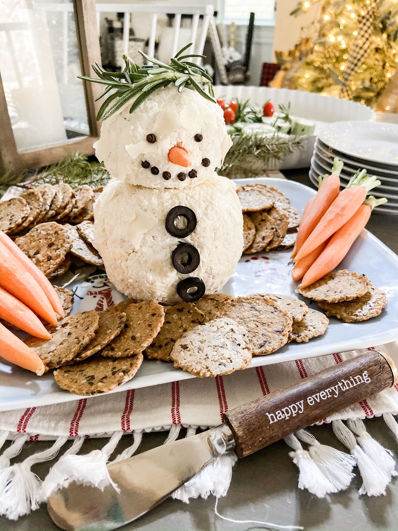 15-Minute Snowman White Cheese Ball Recipe. Mozzarella, cream cheese, Worchesterchire sauce and spices rolled in shaved Parmesan cheese. Divide the cheese ball into two parts and make it into a delightful snowman that will be the hit of any holiday or Winter party! 