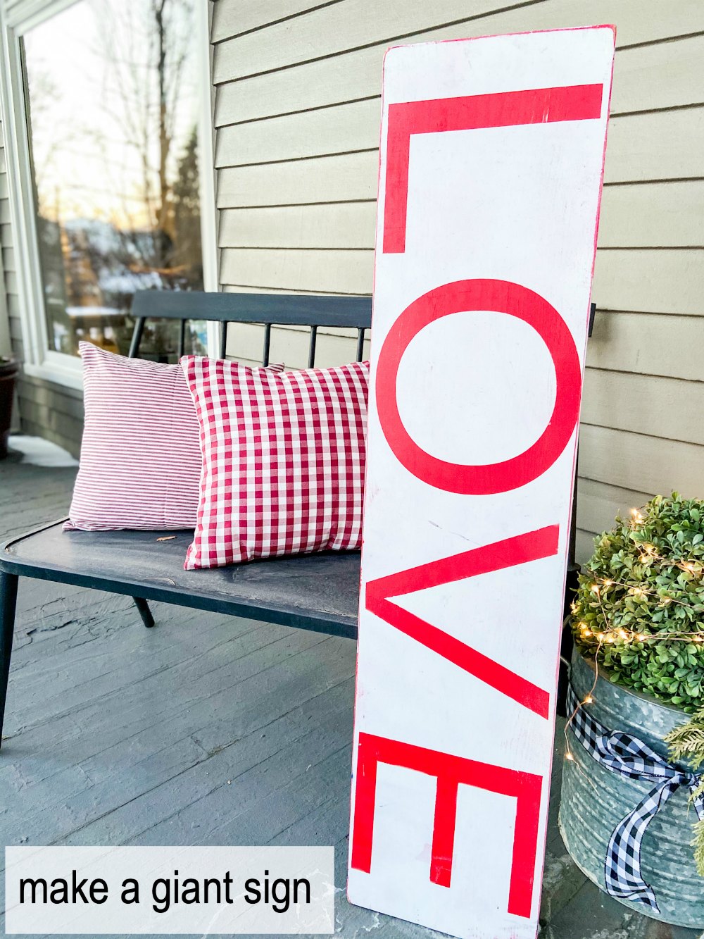 Pink and Red Valentine's Porch. Make a DIY garland, sign, banner, pillow and wreath to create a bright and colorful porch for Valentine's Day! 