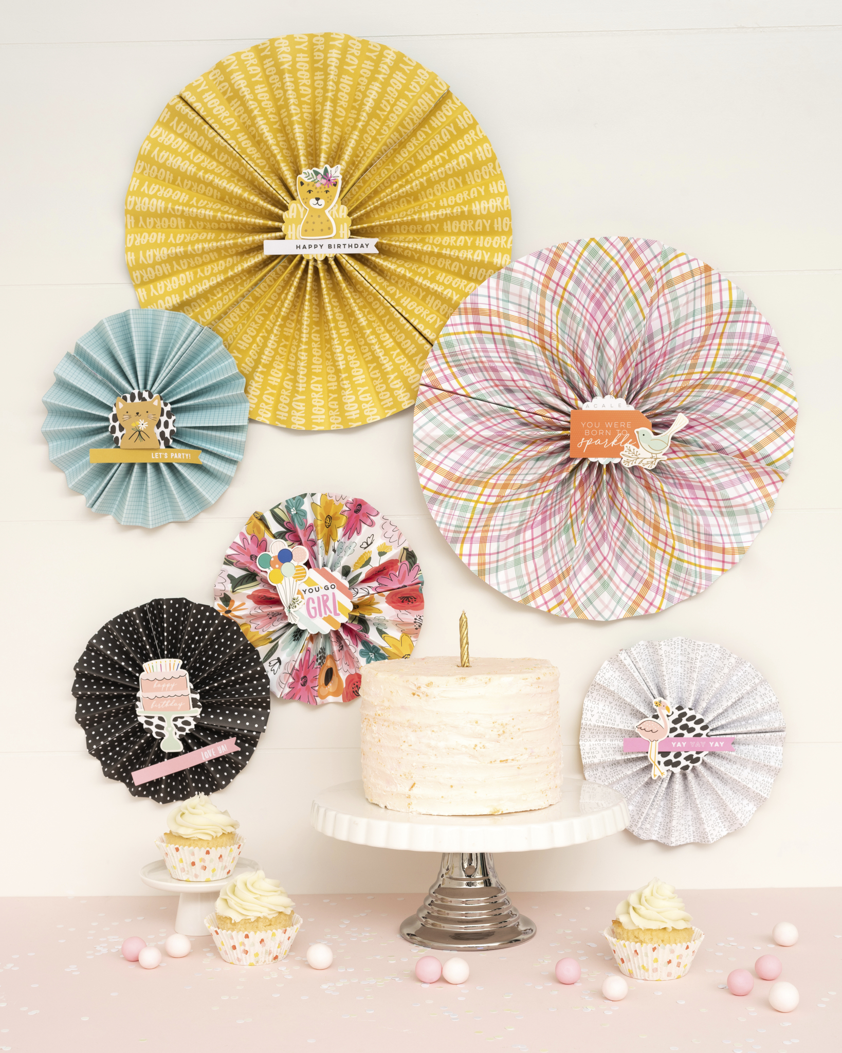 DIY Paper Fan Birthday Garlands. Create a two sizes of birthday garlands in minutes using your favorite scrapbook paper. 