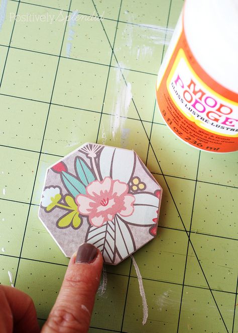 DIY Decoupaged Magnets are fun to make with colorful scrapbook paper, they are a great craft to make with kids! 